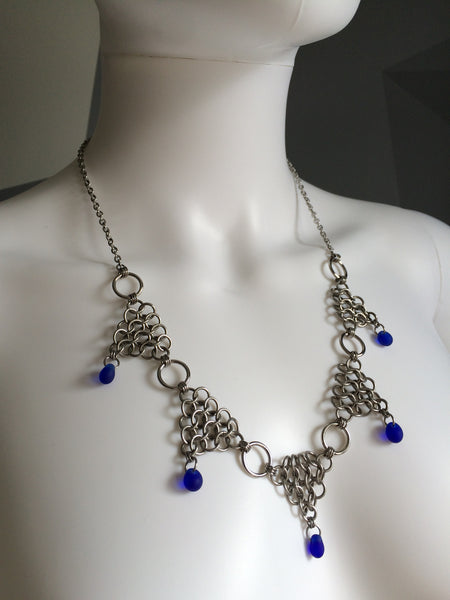 Stainless Steel Triangles with Cobalt Drops